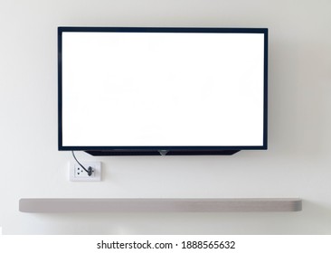 Black Digital Smart TV Stuck On The House Wall On Gray Background