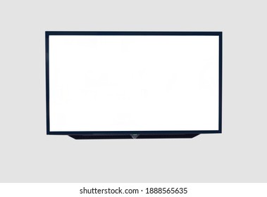 Black digital smart TV stuck on the house wall on gray background - Powered by Shutterstock