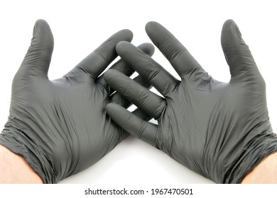 Black Disposable Gloves On The Hands