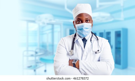 Black Doctor In The Clear Surgical Room. Light Background