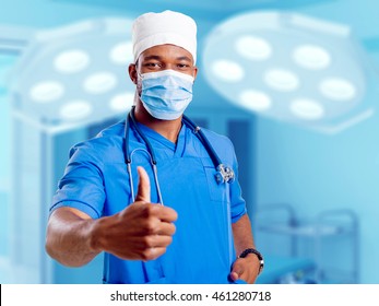 Black Doctor In The Clear Surgical Room. Light Background