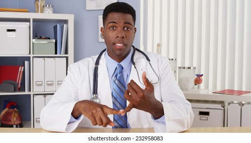 Black Doctor Talking To Camera In Video Chat