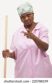 Black Domestic Worker Pointing At A Person Unhappily