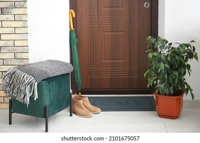 Black Door Mat In Interior Of Modern Hallway