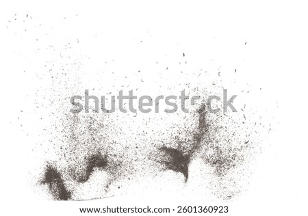 Black dried leave Tea explode. Small Fine size tea leaf flying explosion, Abstract cloud fly. Brown colored Teas splash throwing in Air. White background Isolated high speed shutter, throwing freeze
