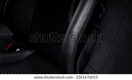 Black drivers seat showing the seat bolster