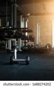 Black Dumbbells On Dark Floor Background Fitness With Weight Equipment For Workout In Gym