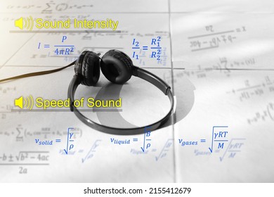 Black Ear Phone With Sound Intensity And Speed Of Sound Eqaution. Physics Equation Concept.