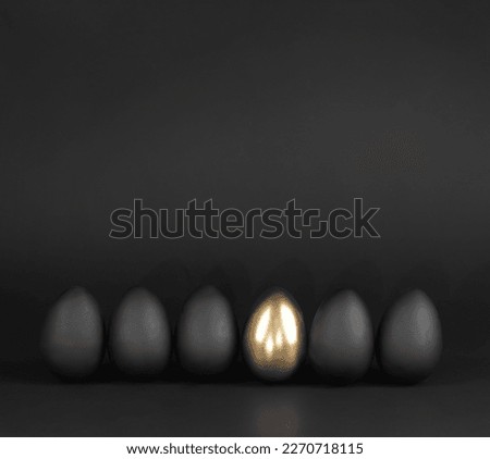 black easter, black eggs and golden egg