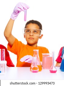 Black Eight Years Old Boy Analyzing Results Of Science Test In The Test Tube