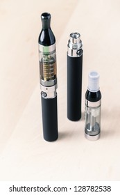 Black electronic nicotine inhalator on table,e-cigarette