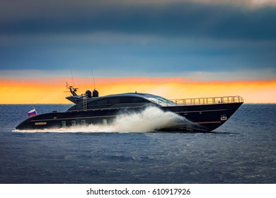 Black Elite Speed Motor Boat Moving Fast From Baltic Sea