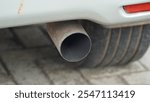 a black exhaust hole on a diesel-fueled MPV vehicle