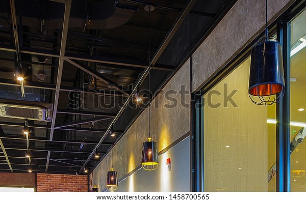 Black Exposed Ceiling Frame Air Conditioner Stock Photo