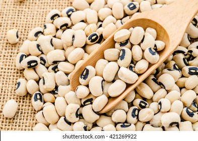 Black Eye Beans On Sack Background.