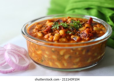 Black Eyed Beans Or Cowpea Beans Gravy. The Gravy Is Cooked With Onions, Tomatoes And Spices And By Adding Roasted Coconut And Onion Garlic Paste. Shot On White Background