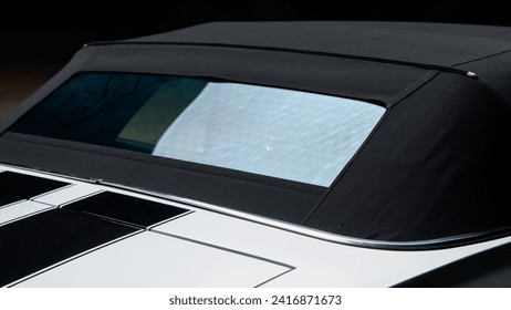 Black fabric convertible top on a car - Powered by Shutterstock