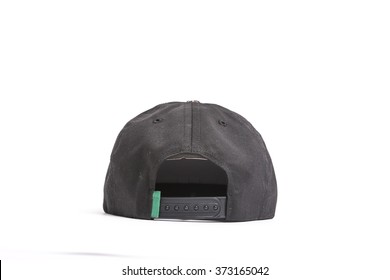 A Black Fabric Hat(cap) With Pattern Back Side View For Hip Hop On The Bottom Isolated White.