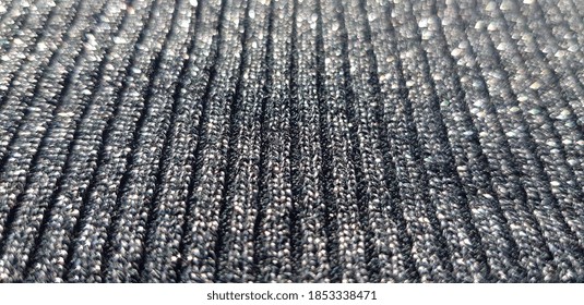 Black Fabric With Machine Knitting And Lurex (seam - Elastic Band, Texture).
