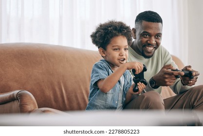 Black family, dad and child playing video games on living room sofa together with controllers at home. Happy African American father with son with smile enjoying bonding time on console entertainment - Powered by Shutterstock