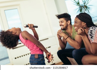 Black Family Enjoy Singing Karaoke