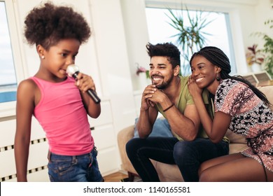 Black Family Enjoy Singing Karaoke