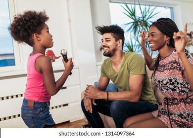 Black Family Enjoy Singing Karaoke