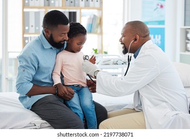 Black Family, Girl And Pediatrician Doctor With Stethoscope, Consulting Healthcare Worker Or Medical Employee. Kids, Happy Father With Smile Or Trust Pediatrician In Hospital Insurance Test For Heart