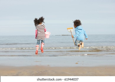 Black Family On A Beach