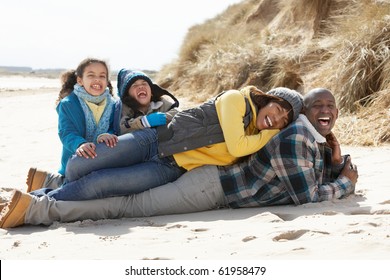 Black Family On A Beach