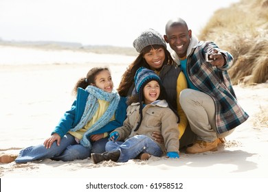 Black Family On A Beach