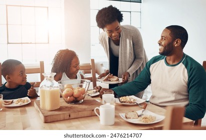 Black family, parents and children for breakfast in home with serving, bonding and happy in dining room. Love, mother and father with kids in morning with food, eggs and bread for nutrition or hungry - Powered by Shutterstock