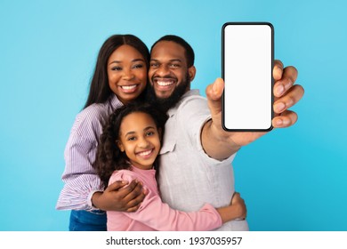 Black Family Showing Blank Empty Smartphone Screen For Mockup