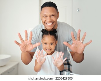 Black Family With Soap On Hands In Bathroom For Bacteria Cleaning Safety, Learning Or Teaching Hygiene Healthcare Portrait. Wellness Father Showing Girl Child How To Wash Germs With Foam For Skincare