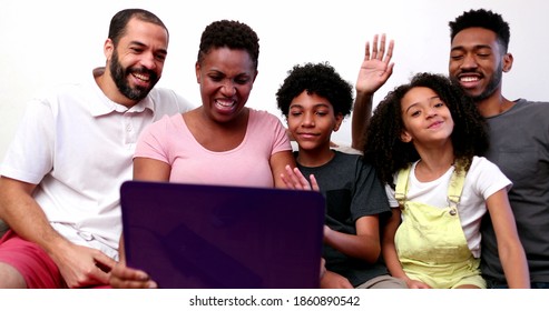 Black Family Waving Hello Or Good Bye To Relative On Video Conference