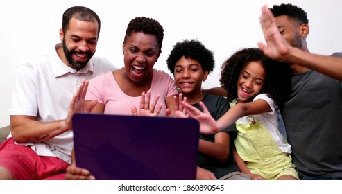 Black Family Waving Hello Or Good Bye To Relative On Video Conference