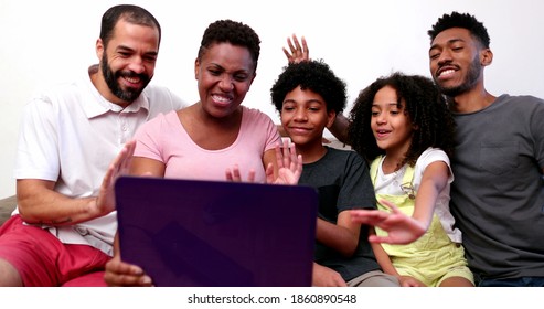 Black Family Waving Hello Or Good Bye To Relative On Video Conference