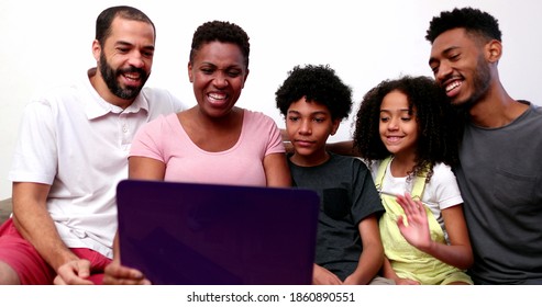 Black Family Waving Hello Or Good Bye To Relative On Video Conference