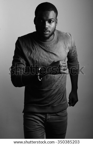 Similar – Image, Stock Photo African student with a bald head wearing a white shirt