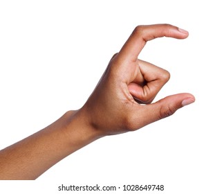 Black Female Hand Measuring Invisible Items, Woman's Palm Making Gesture While Showing Small Amount Of Something On White Isolated Background