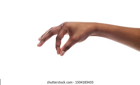 Black female hand picking up invisible small items isolated on white background. Panorama with copy space