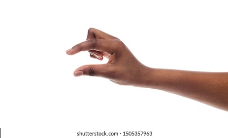 Black female hand showing small amount of something, measuring invisible items, isolated on white background. Panorama with copy space
