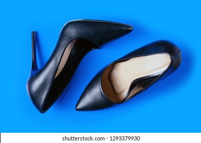 Black Female High Heel Shoes On Pink Background, Top View