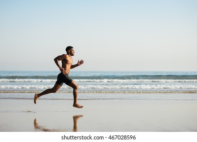 running barefoot on beach