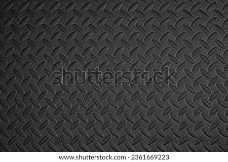 Black floor background with grip perforation close up flat view