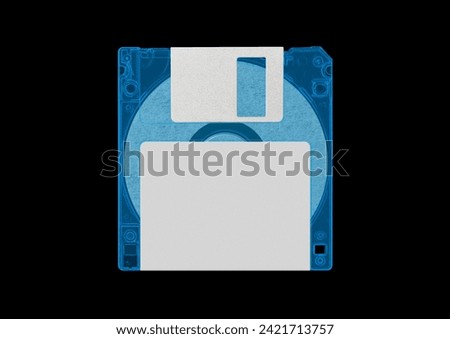 Black floppy disk or diskette isolated on black background