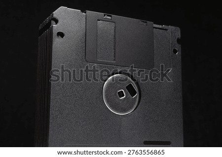 Black floppy disks for data backup in retro computing