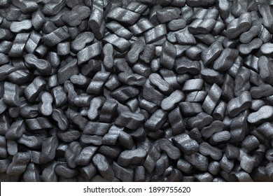 Black Foam Peanuts Packaging Filler Cushioning  Polystyrene Material Texture  Shipping Background