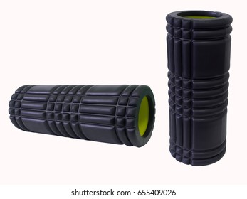 A black foam roller used in for muscles therapy on the white isolated background.