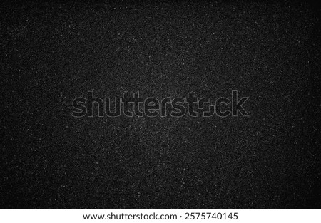 Black foam rubber texture background. Black foam surface, top view, backdrop